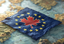 Stellantis nel vortice dei dazi di Trump Ipotetica bandiera della Nuova Unione tra Europa e Canada (Midjourney)